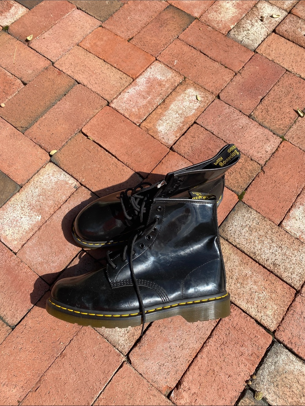 Dr. Martens Black Leather 8-Eye Lace-Up Boots with Yellow Stitching